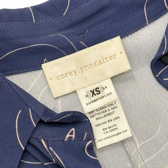 Women’s Corey Lynn Calter jumpsuit navy/pink face print sleeveless 2010s - Picture 2 of 5